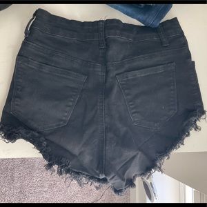 High waisted, ripped shorts